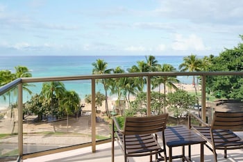 Hotel room view looking out at Waikiki Circle Hotel By Castle