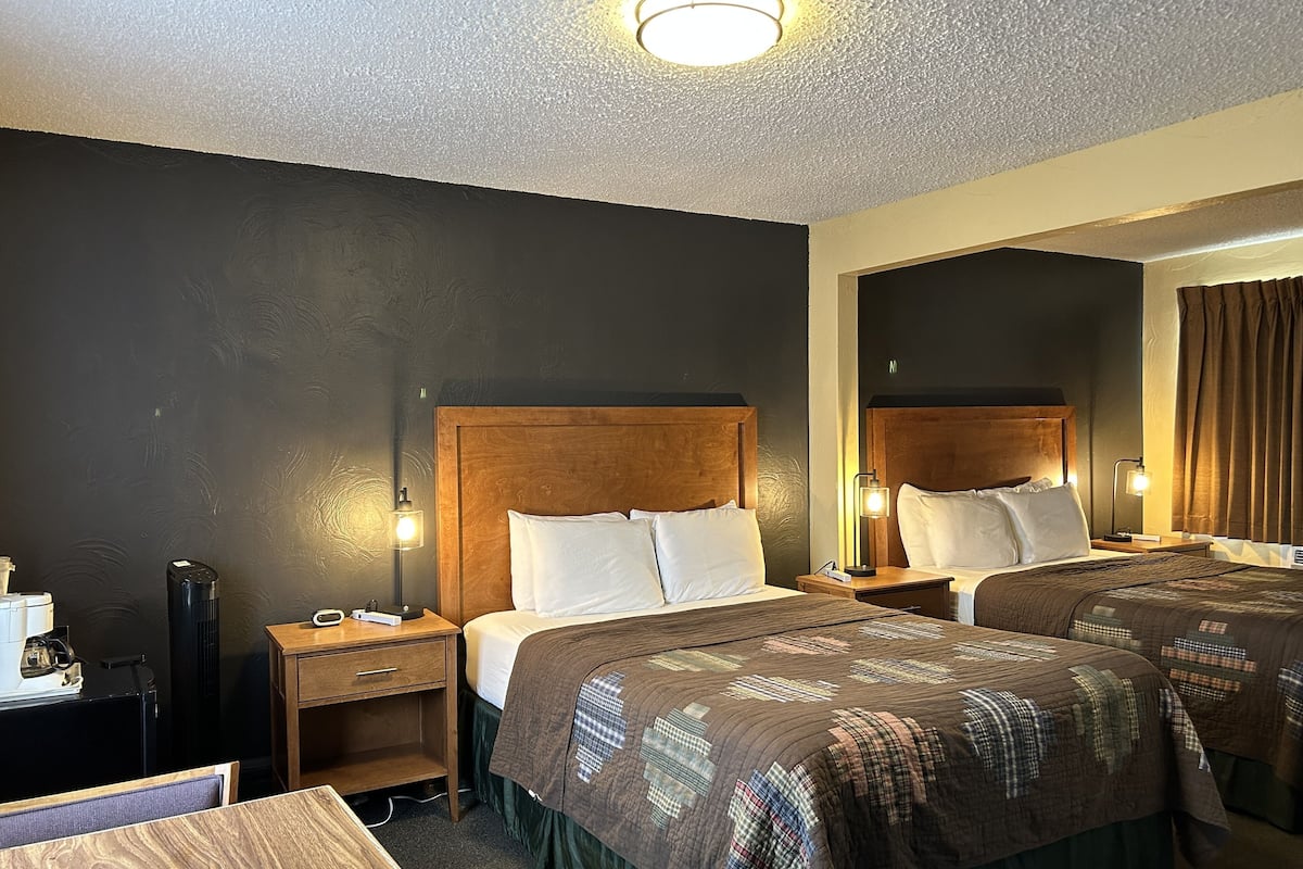 Two Queens | Desk, blackout drapes, free WiFi, bed sheets
