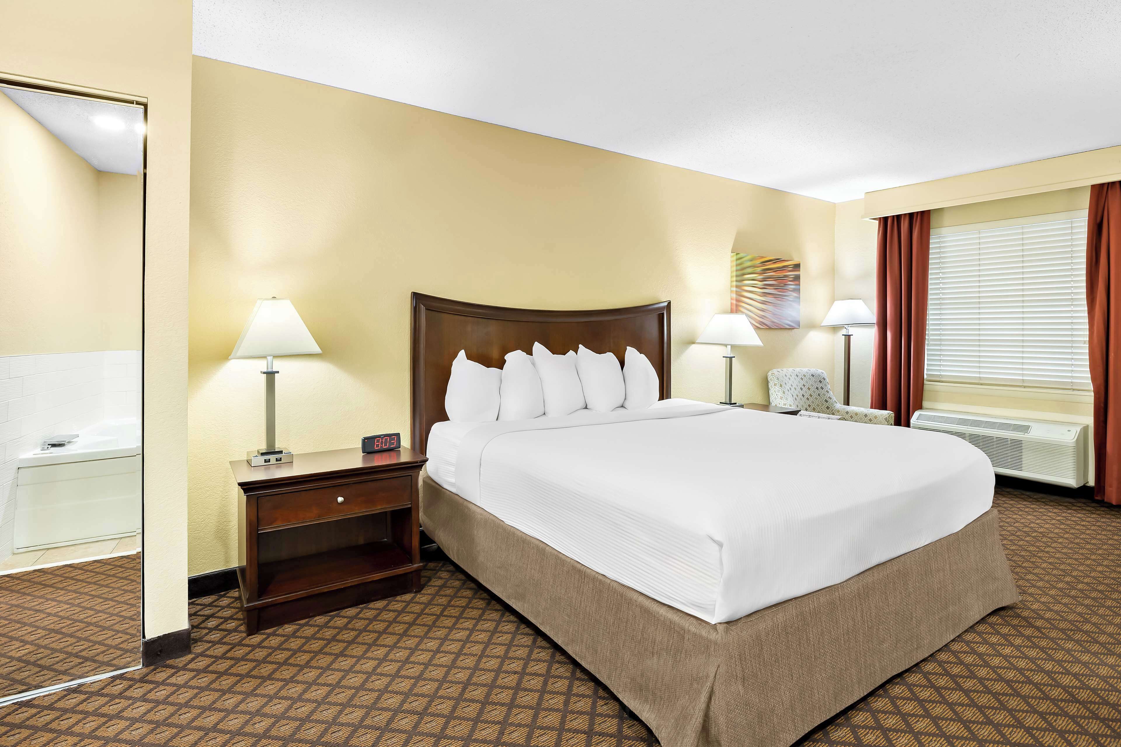 suite, 1 king bed, non smoking, jetted tub | premium bedding, pillow-top beds, individually furnished, desk