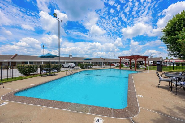 Outdoor pool, open 10:00 AM to 10:00 PM, pool umbrellas, sun loungers