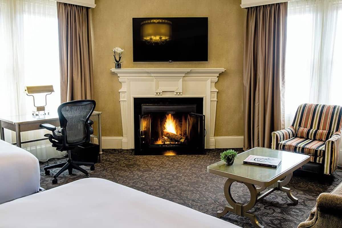 executive room, 2 queen beds, fireplace | in-room safe, desk, laptop workspace, blackout curtains