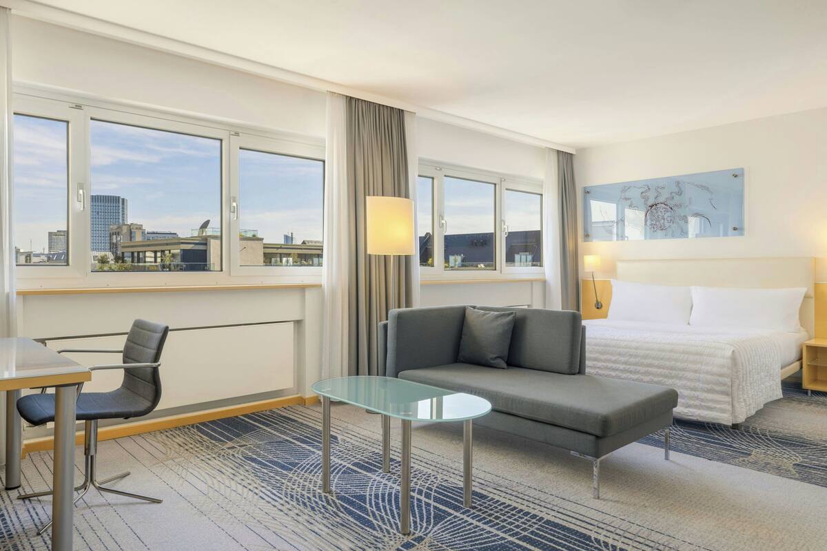 Deluxe Room, 1 King Bed | Premium bedding, in-room safe, desk, laptop workspace