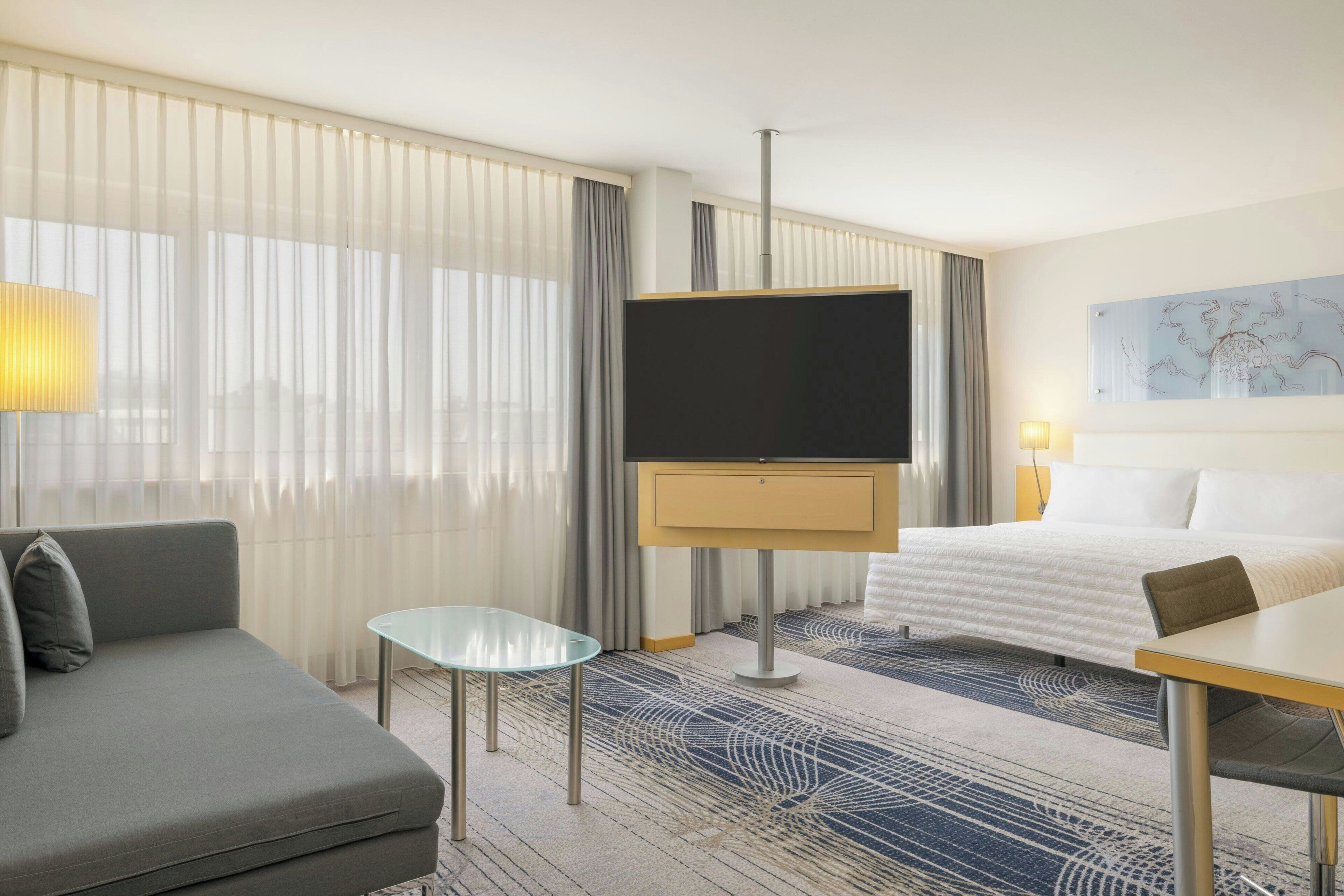 Deluxe Room, 1 King Bed | Premium bedding, in-room safe, desk, laptop workspace