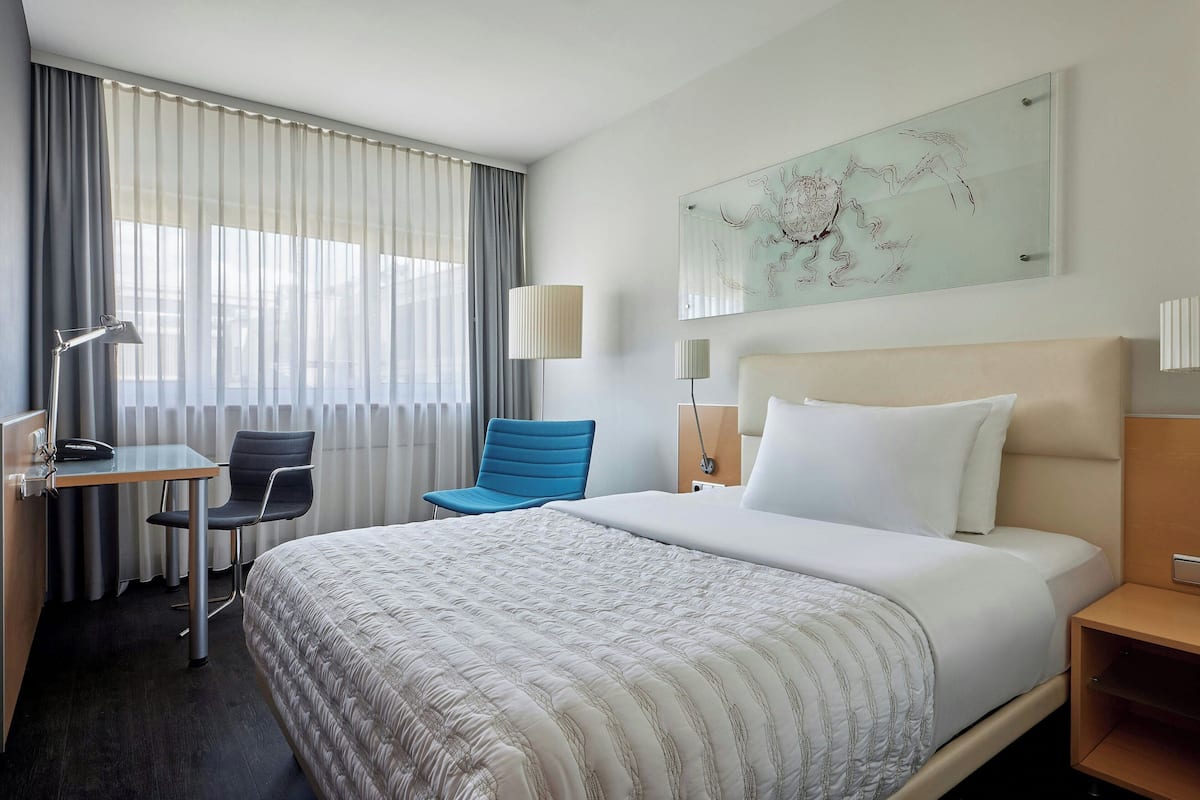 Habitación superior, 1 cama individual | 1 habitación y ropa de cama de alta calidad