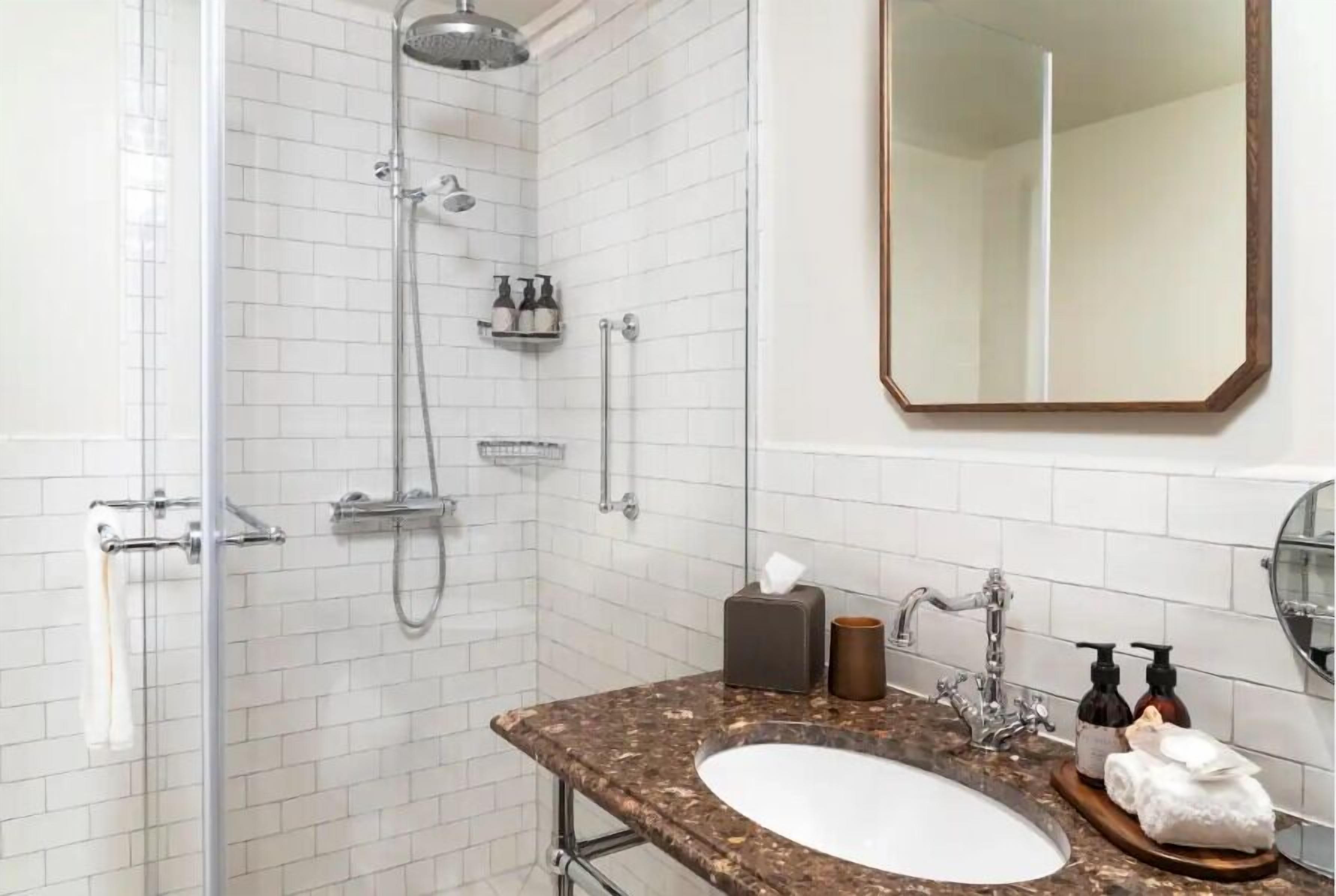 shower, rainfall showerhead, designer toiletries, hair dryer