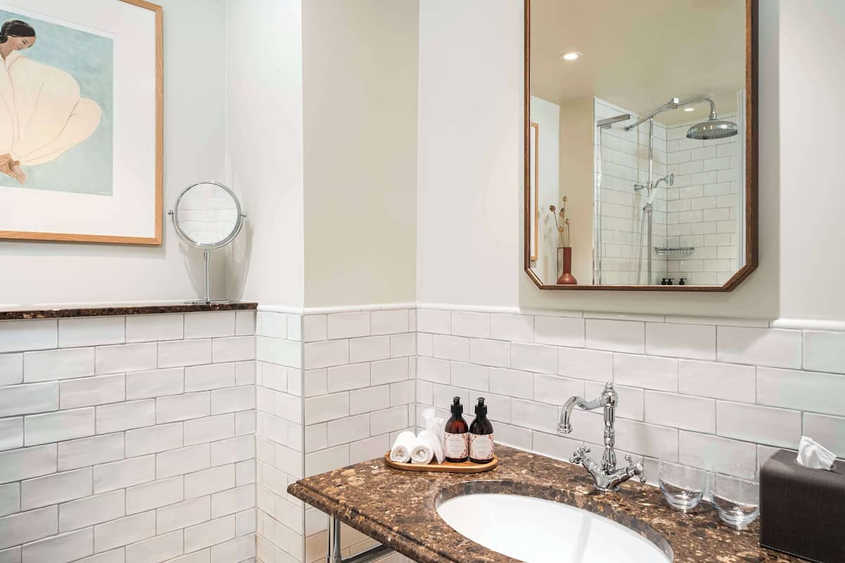 shower, rainfall showerhead, designer toiletries, hair dryer