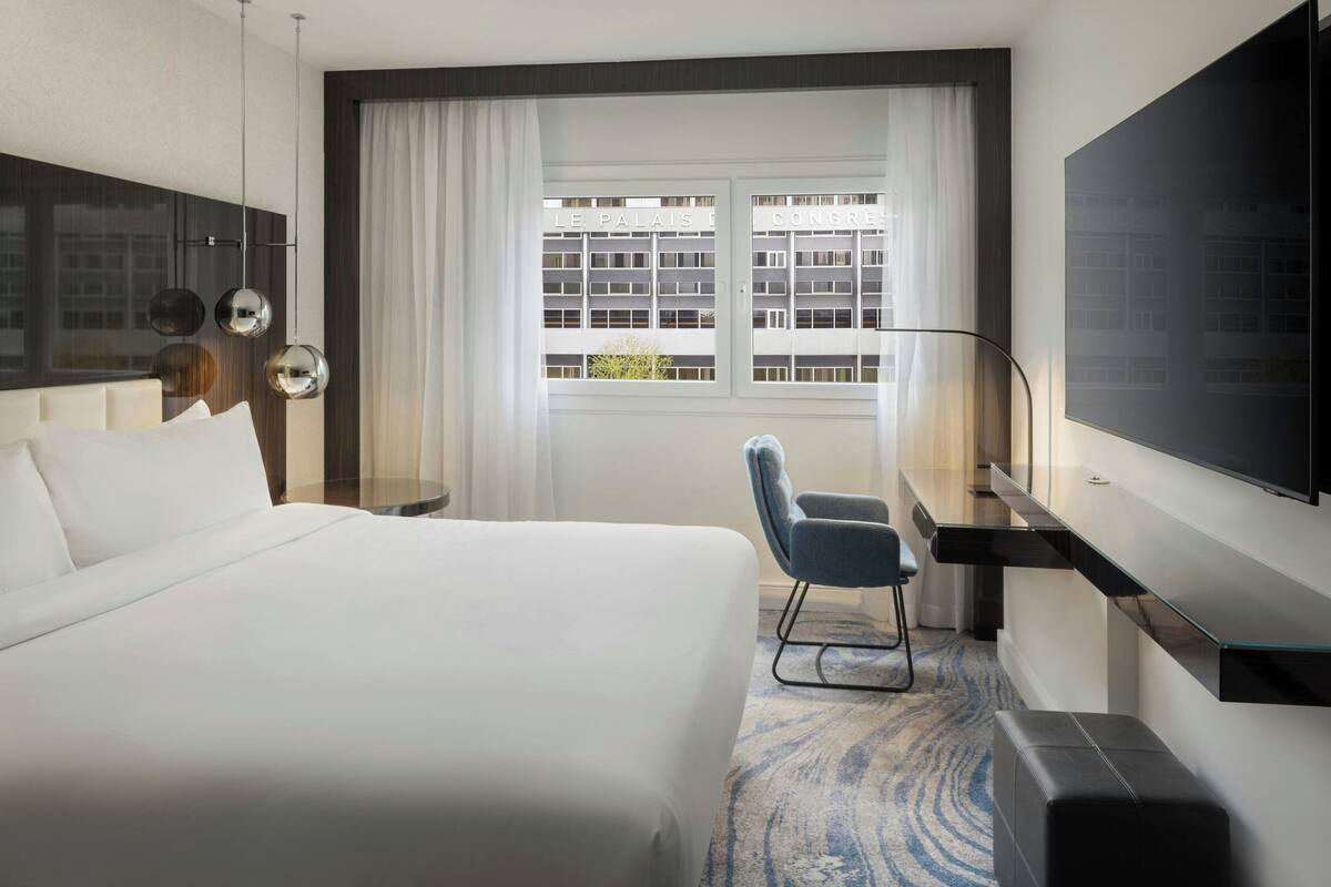 Habitación Deluxe, 1 cama King size | Ropa de cama de alta calidad y minibar 