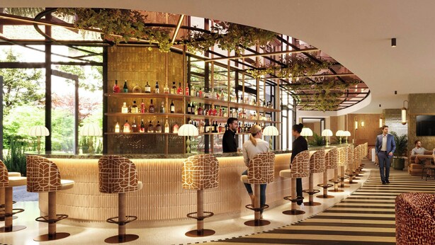 A bar area with a curved counter, bar stools, and a variety of bottles. - Le Méridien Paris Arc De Triomphe (Paris)