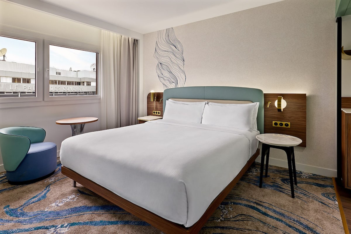 Senior Quadruple Room, 1 Bedroom | Minibar, in-room safe, individually decorated, individually furnished