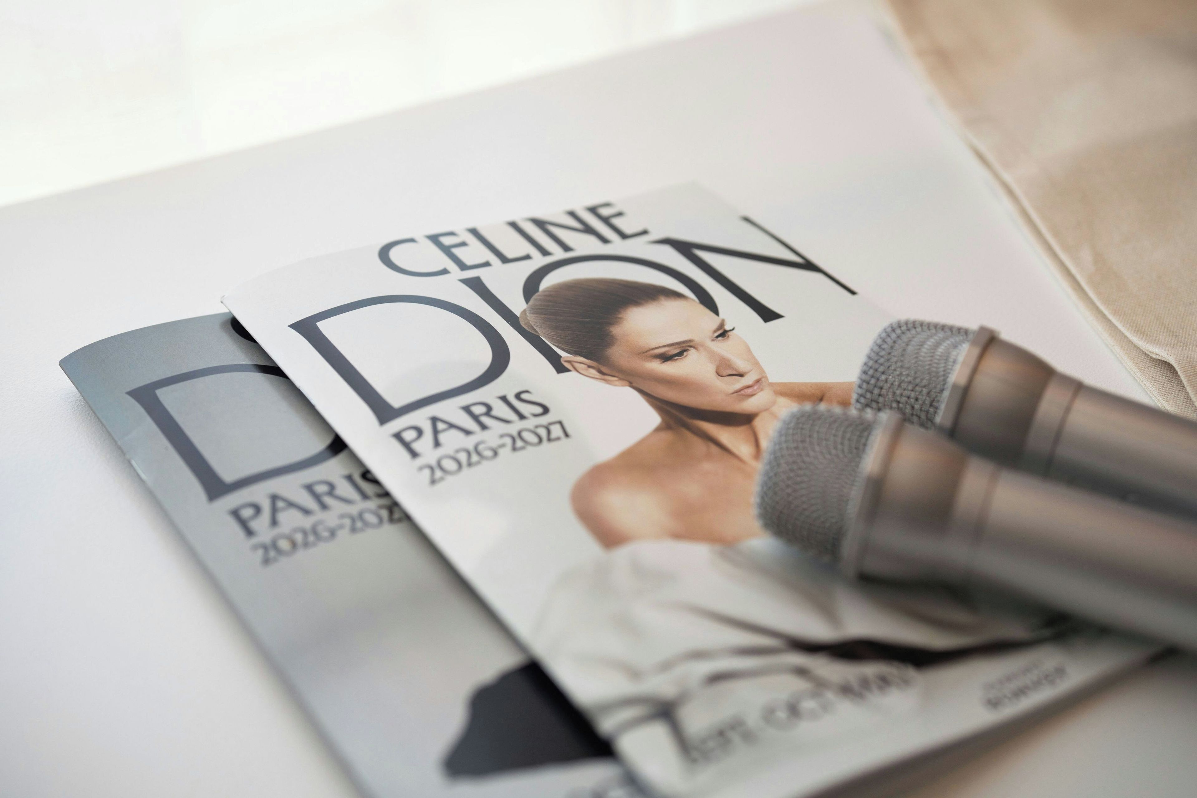 A magazine with the title 'CELINE' and the word 'PARIS' visible on the cover.
