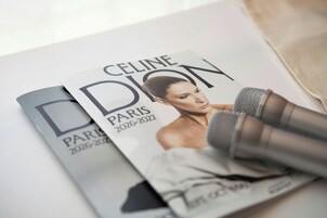 A magazine with the title 'CELINE' and the word 'PARIS' visible on the cover.