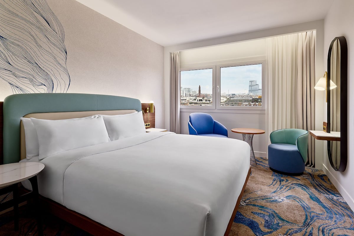 Executive Room, 1 Double Bed | Premium bedding, minibar, in-room safe, individually decorated