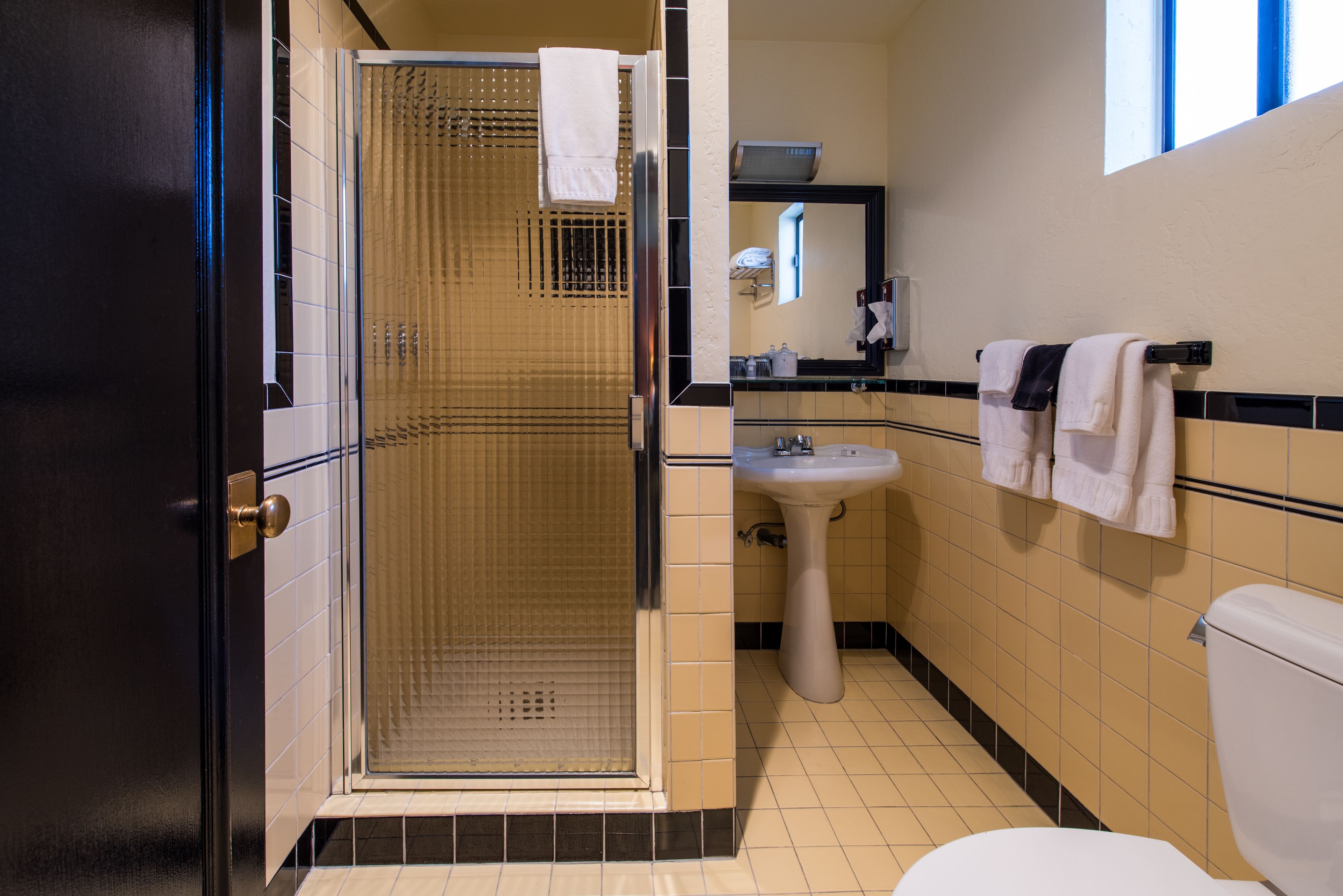 design room, 1 queen bed | bathroom | shower, designer toiletries, hair dryer, towels