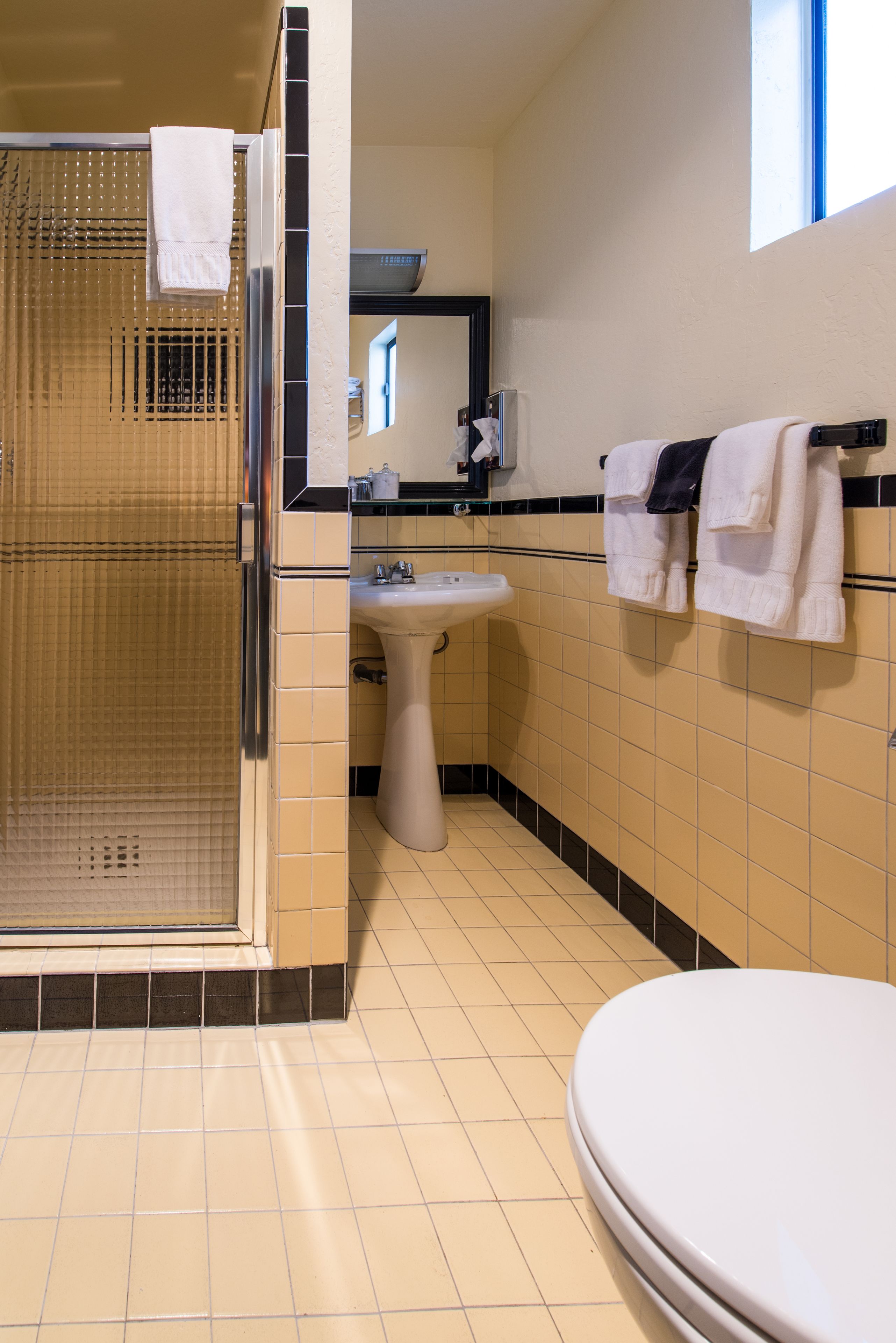 design room, 1 queen bed | bathroom | shower, designer toiletries, hair dryer, towels