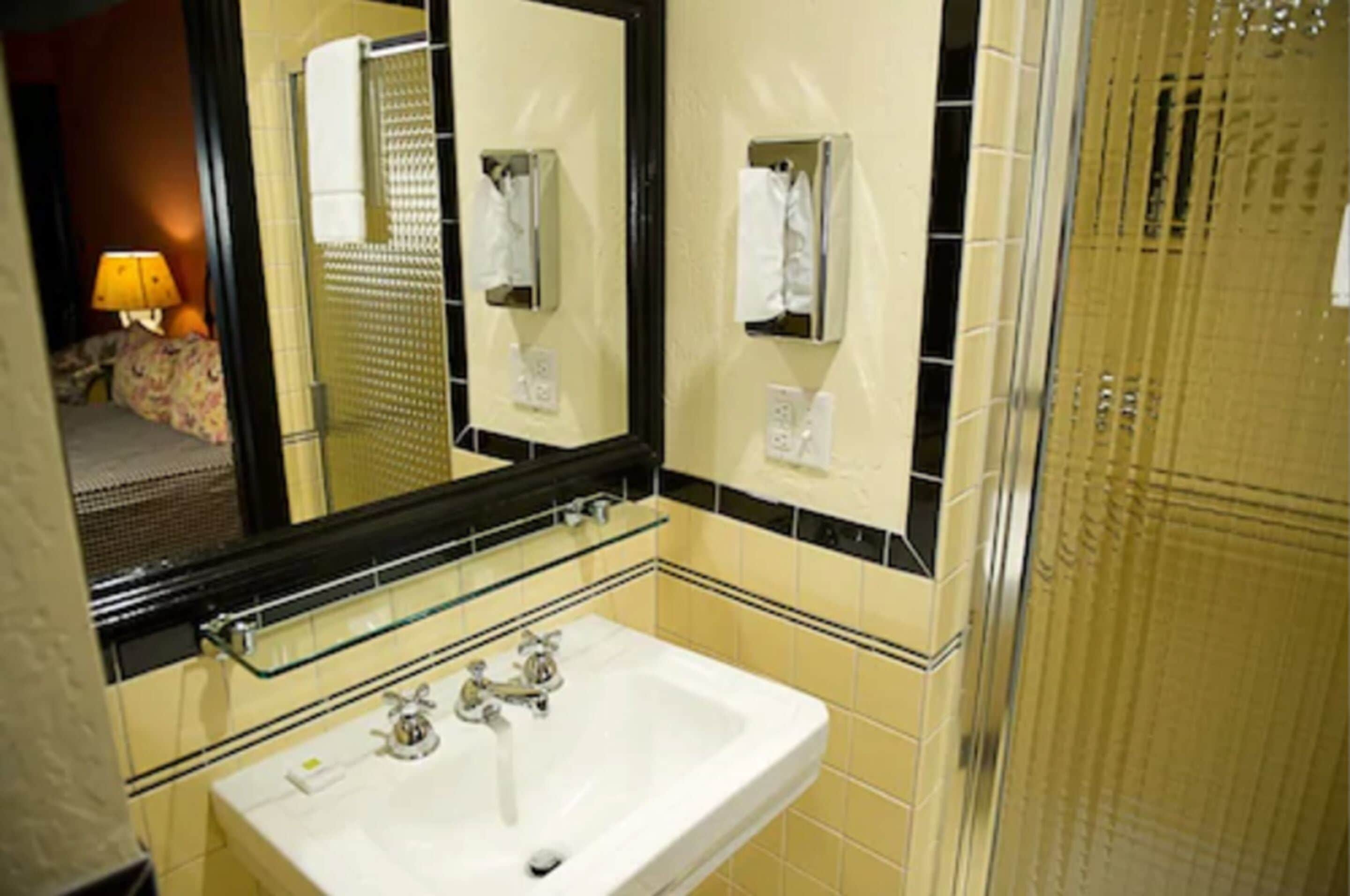 design room, 1 queen bed | bathroom | shower, designer toiletries, hair dryer, towels