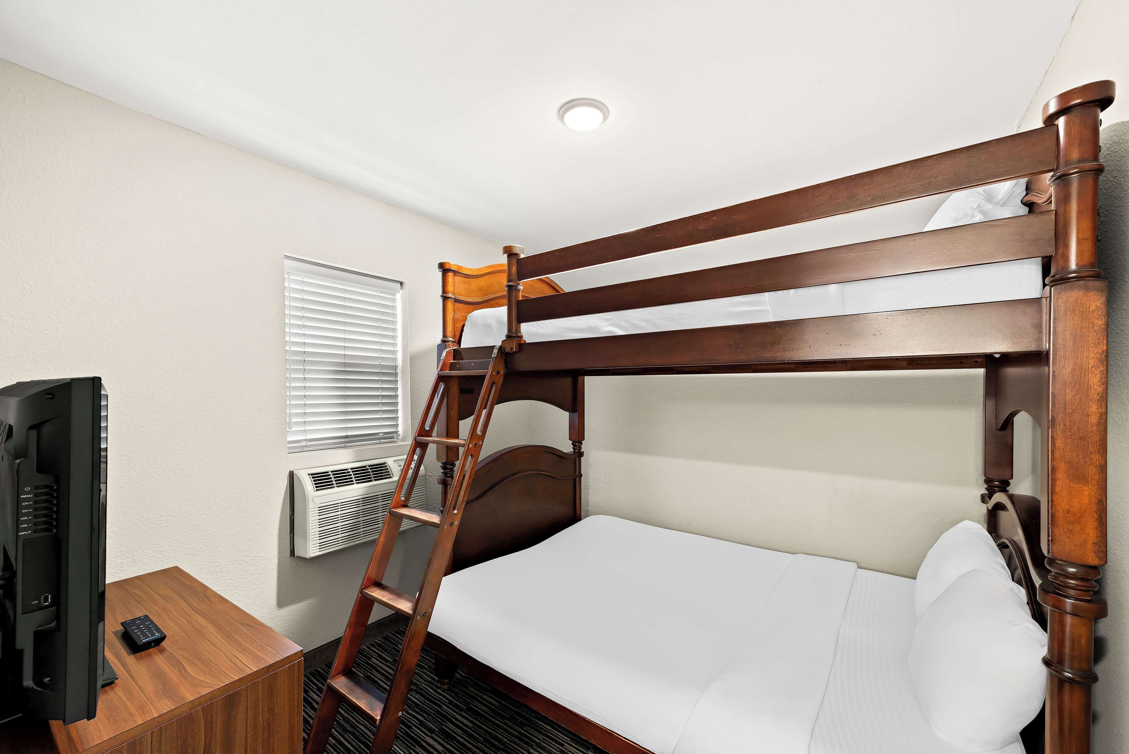 family suite, multiple beds, non smoking, refrigerator & microwave | 1 bedroom, individually decorated, desk, blackout curtains