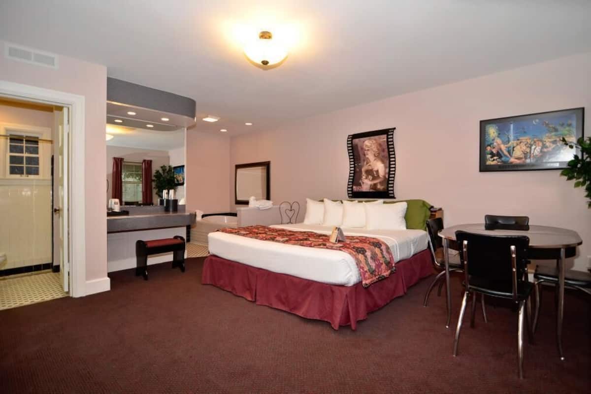 Individually decorated, desk, blackout drapes, iron/ironing board