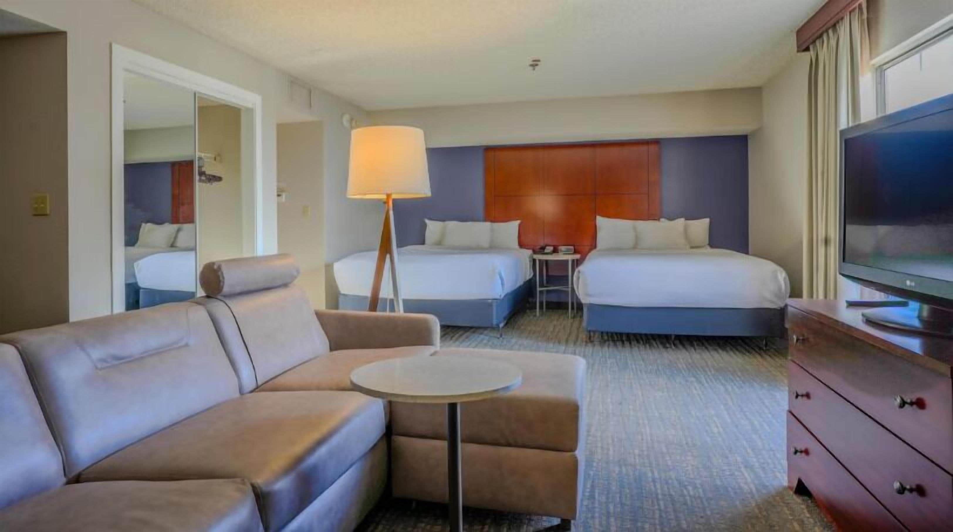 Studio Suite, 2 Queen Beds | Desk, laptop workspace, iron/ironing board, WiFi (free)
