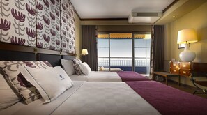 Suite, Balcony, Sea View | Minibar, in-room safe, blackout curtains, free WiFi