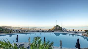 Outdoor pool, open 9:00 AM to 7:00 PM, pool umbrellas, sun loungers