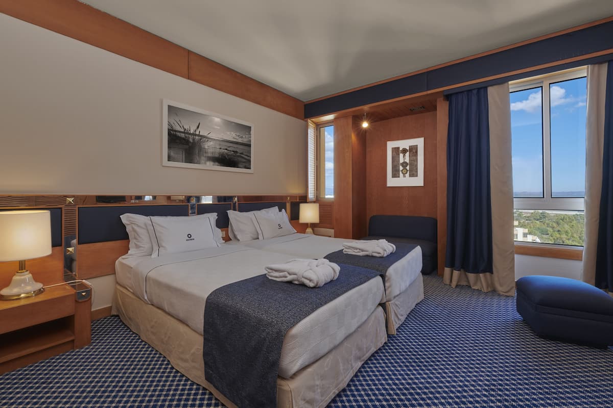 Een minibar, een kluis op de kamer, verduisterende gordijnen