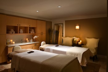 Couples treatment rooms, sauna, spa tub, steam room, body treatments at Trump National Doral Miami