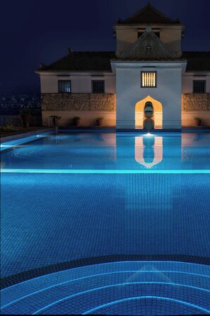 2 outdoor pools, open 6:00 AM to 8:00 PM, pool umbrellas, pool loungers