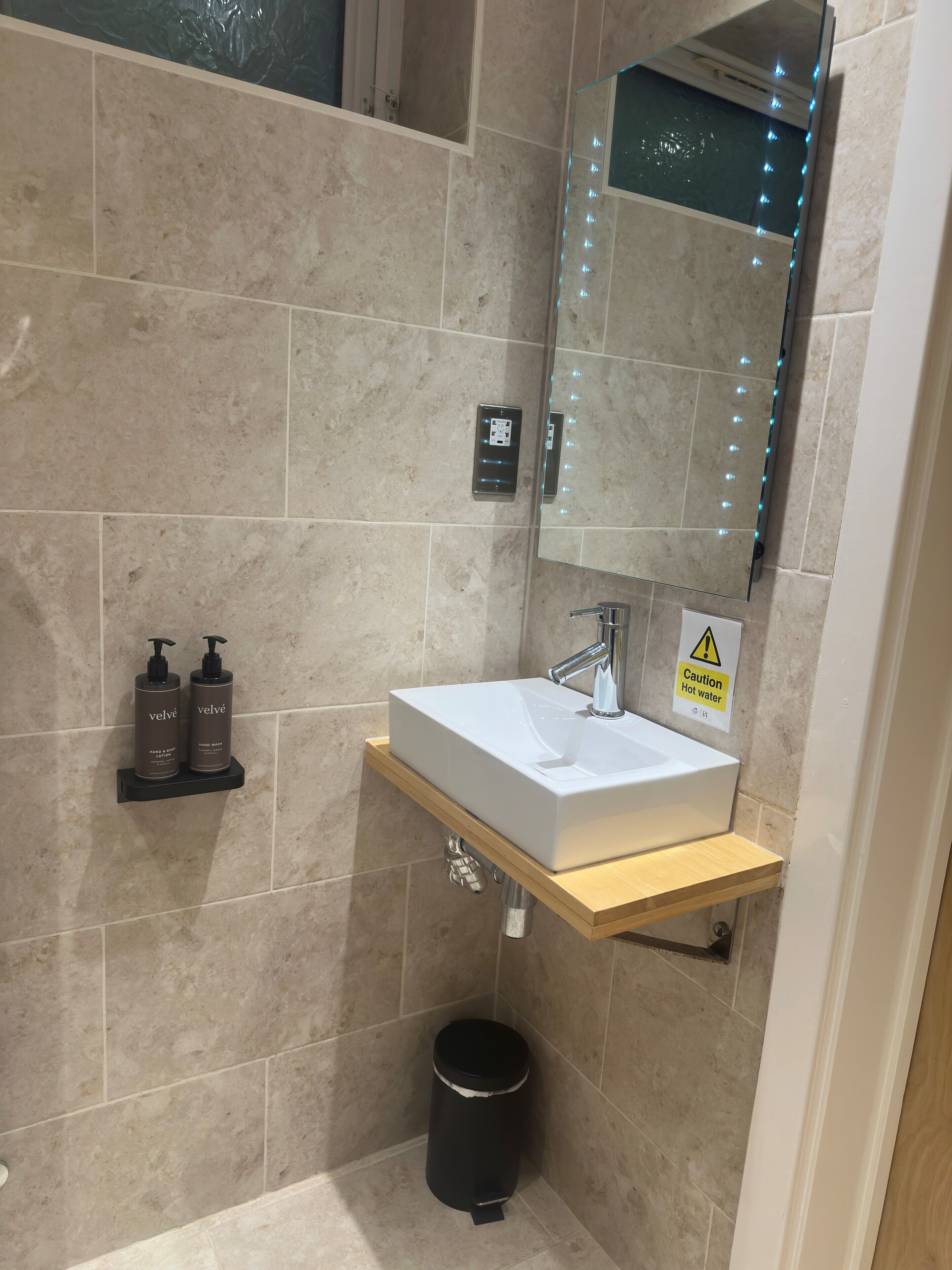 eco-friendly toiletries, hair dryer, towels