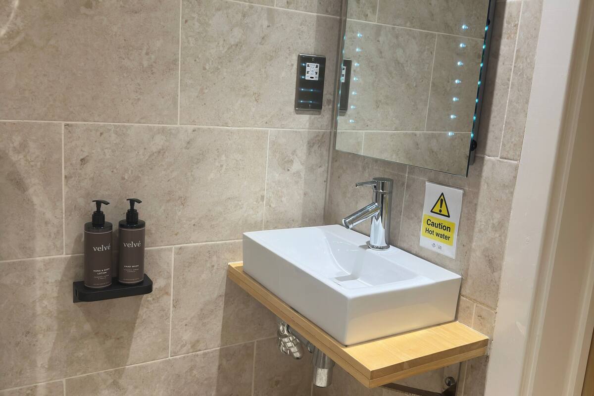 eco-friendly toiletries, hair dryer, towels