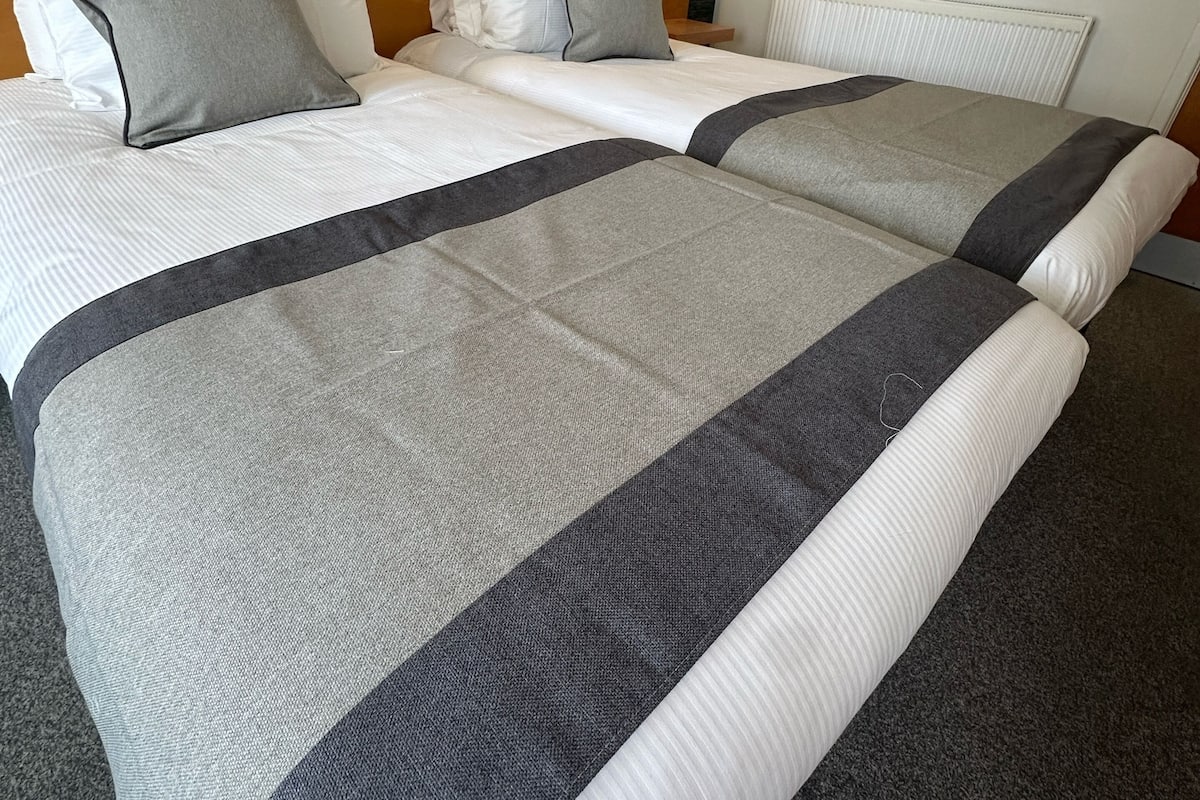 twin room | individually decorated, individually furnished, desk, iron/ironing board