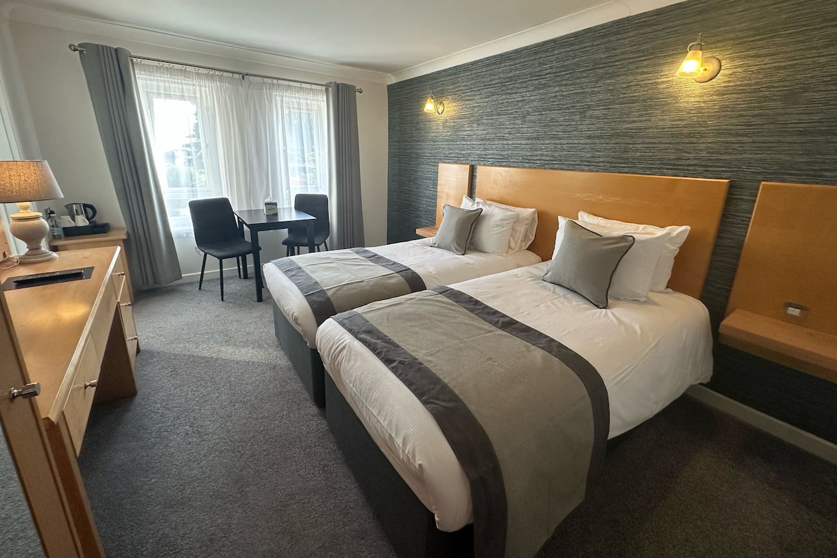 twin room | individually decorated, individually furnished, desk, iron/ironing board