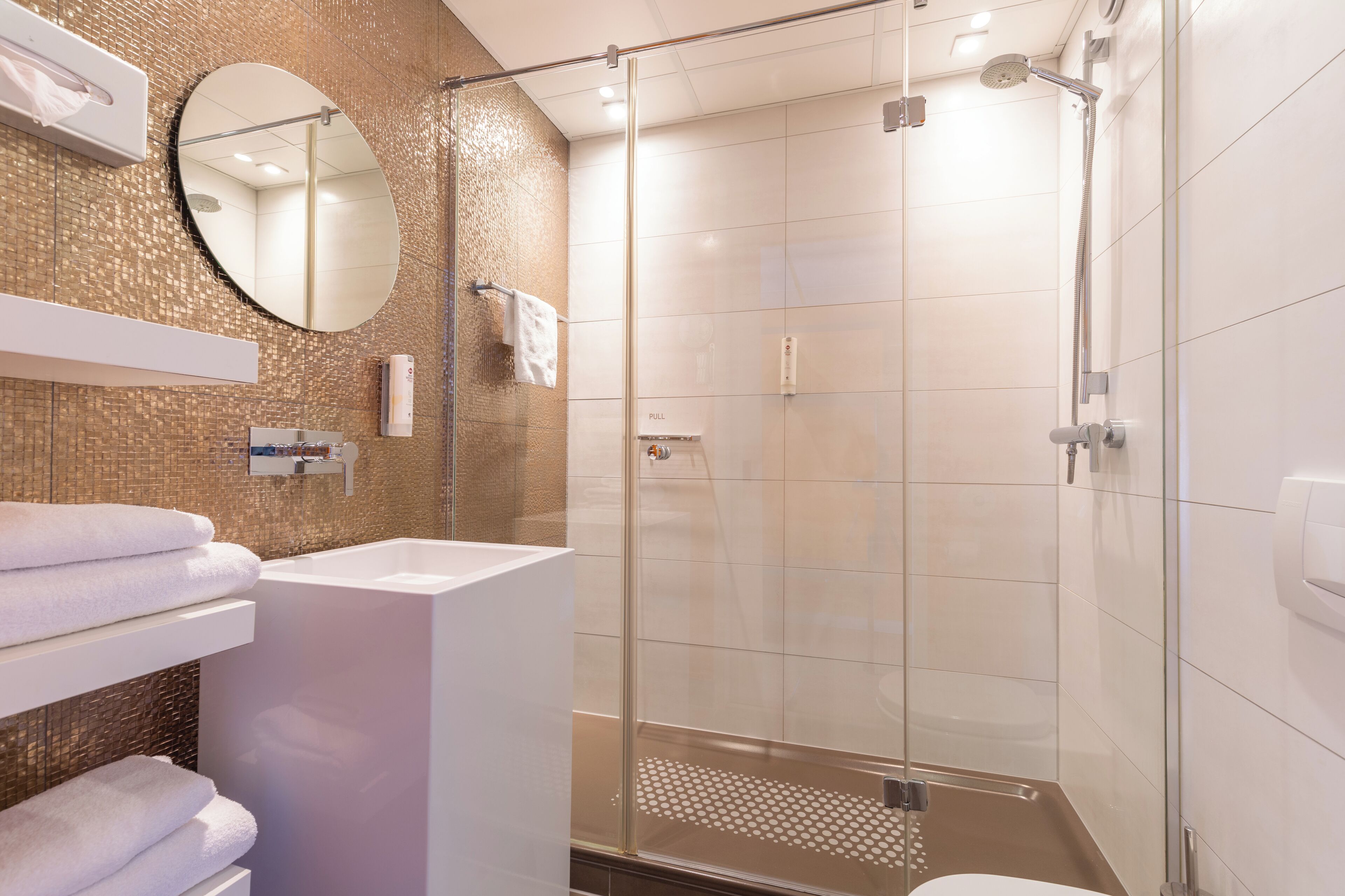 shower, eco-friendly toiletries, hair dryer, towels