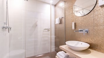 Shower, eco-friendly toiletries, hair dryer, towels