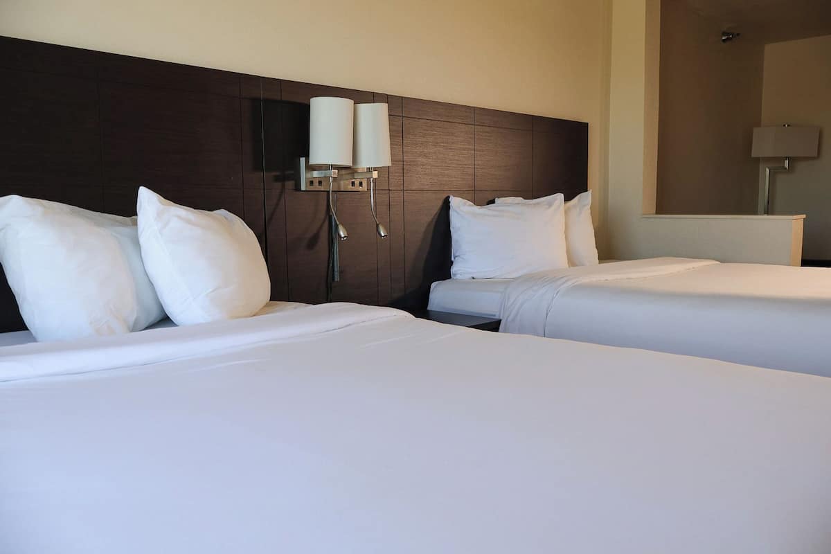 Junior Room, 2 Queen Beds | Pillowtop beds, desk, laptop workspace, iron/ironing board