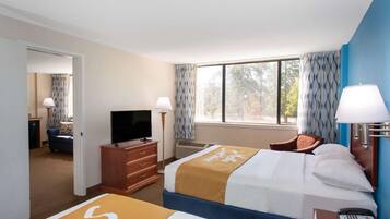 Suite, 2 Queen Beds, Non Smoking | Desk, iron/ironing board, free cribs/infant beds, rollaway beds