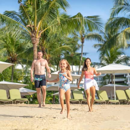 On the beach, sun loungers, beach towels, kayaking