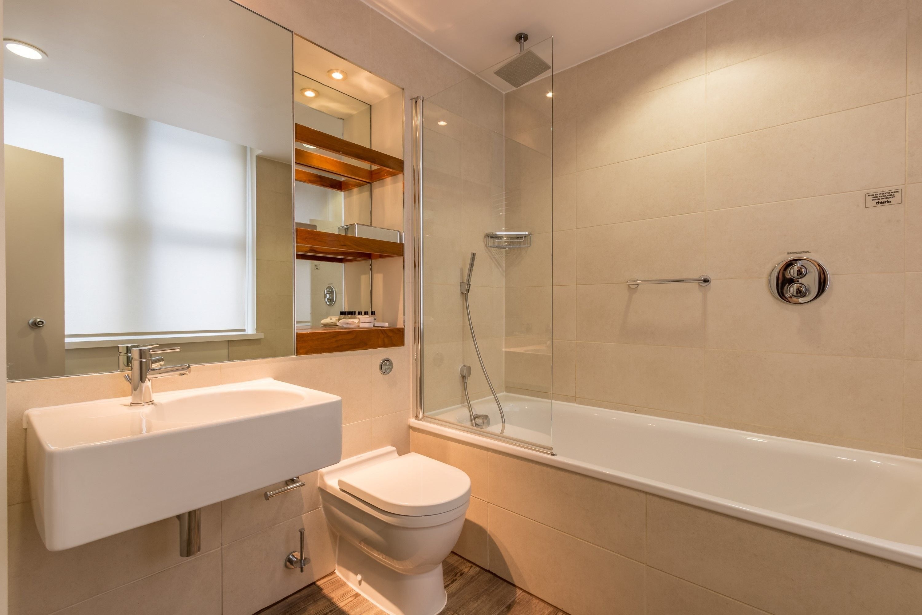 combined shower/bathtub, rainfall showerhead, eco-friendly toiletries