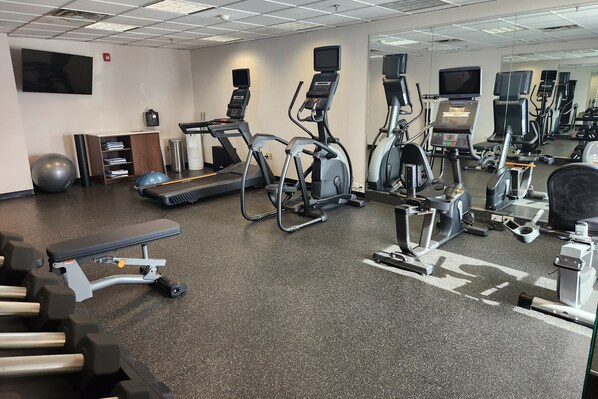 A gym with treadmills, elliptical machines, and free weights. - Holiday Inn Express Philadelphia NE - Bensalem by IHG (Bensalem)