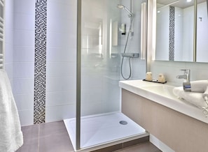 Eco-friendly toiletries, hair dryer, towels, soap