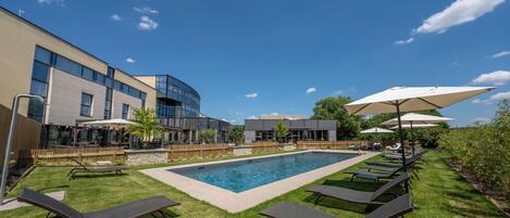 Seasonal outdoor pool, pool loungers