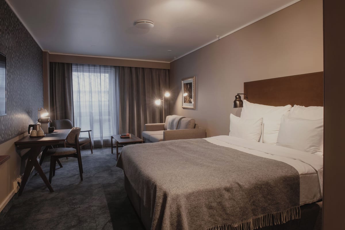 Deluxe Room, 1 Double Bed | Desk, laptop workspace, blackout curtains, cots/infant beds