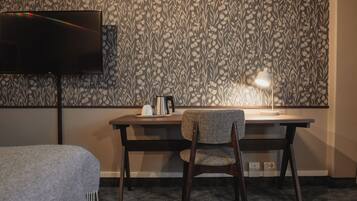 Superior Room | Living area | 37-inch flat-screen TV with cable channels