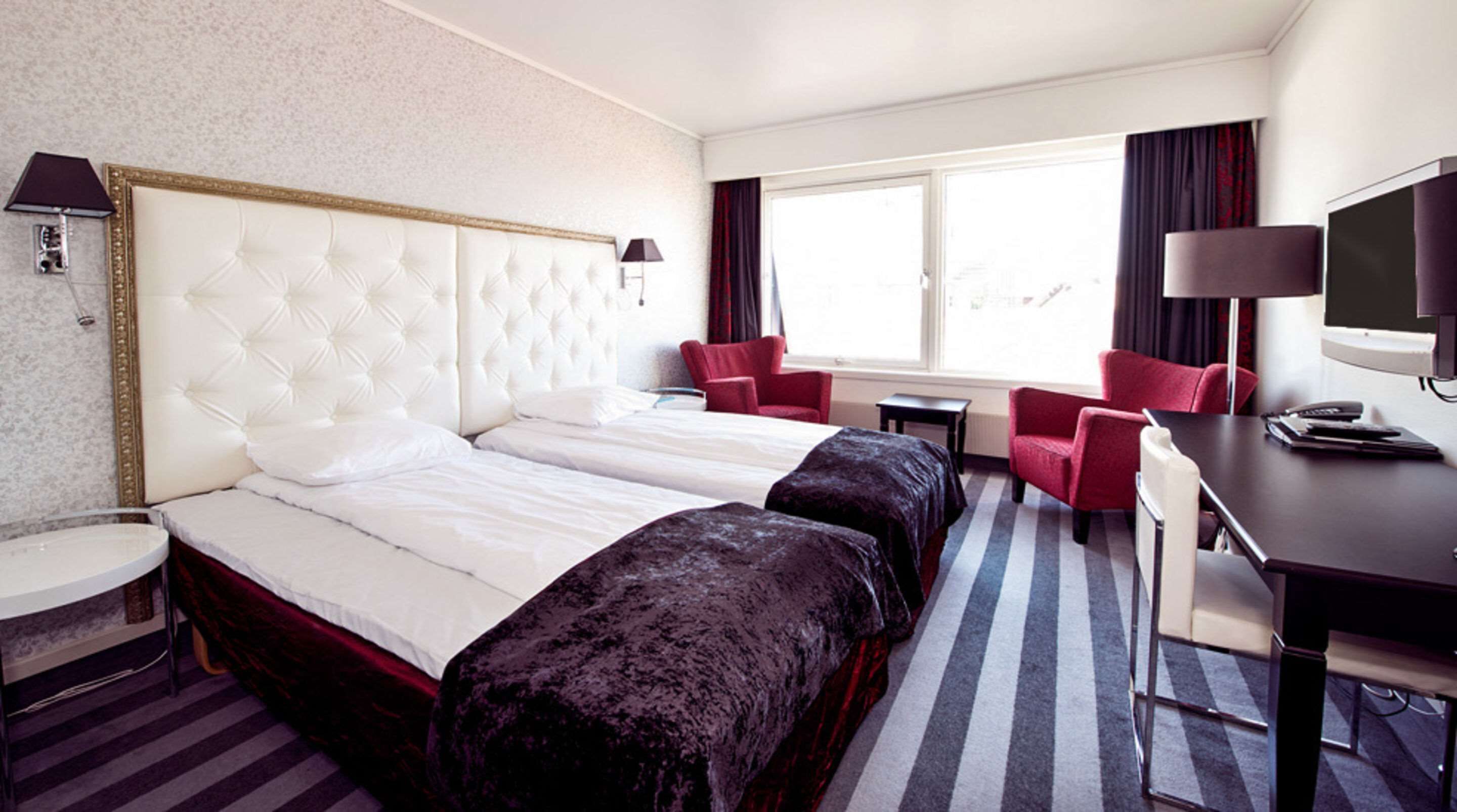 desk, laptop workspace, blackout curtains, cots/infant beds