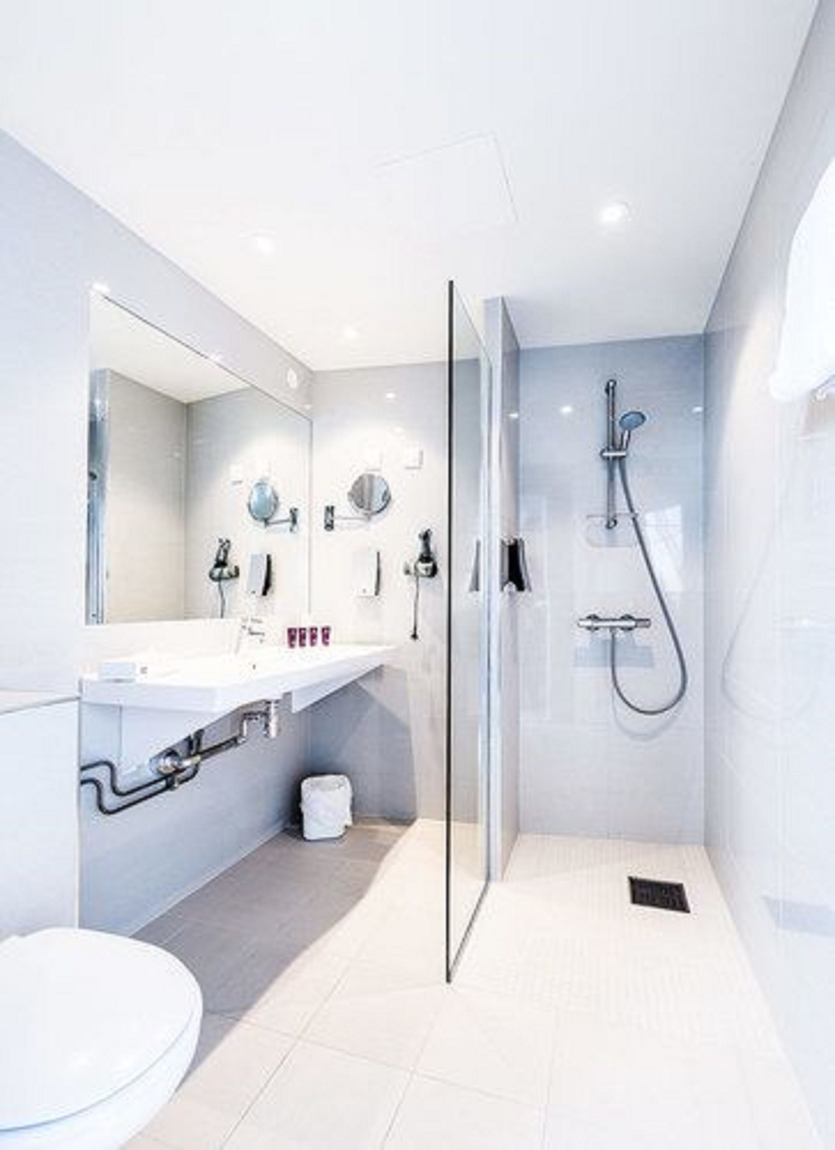 hair dryer, towels, toilet paper