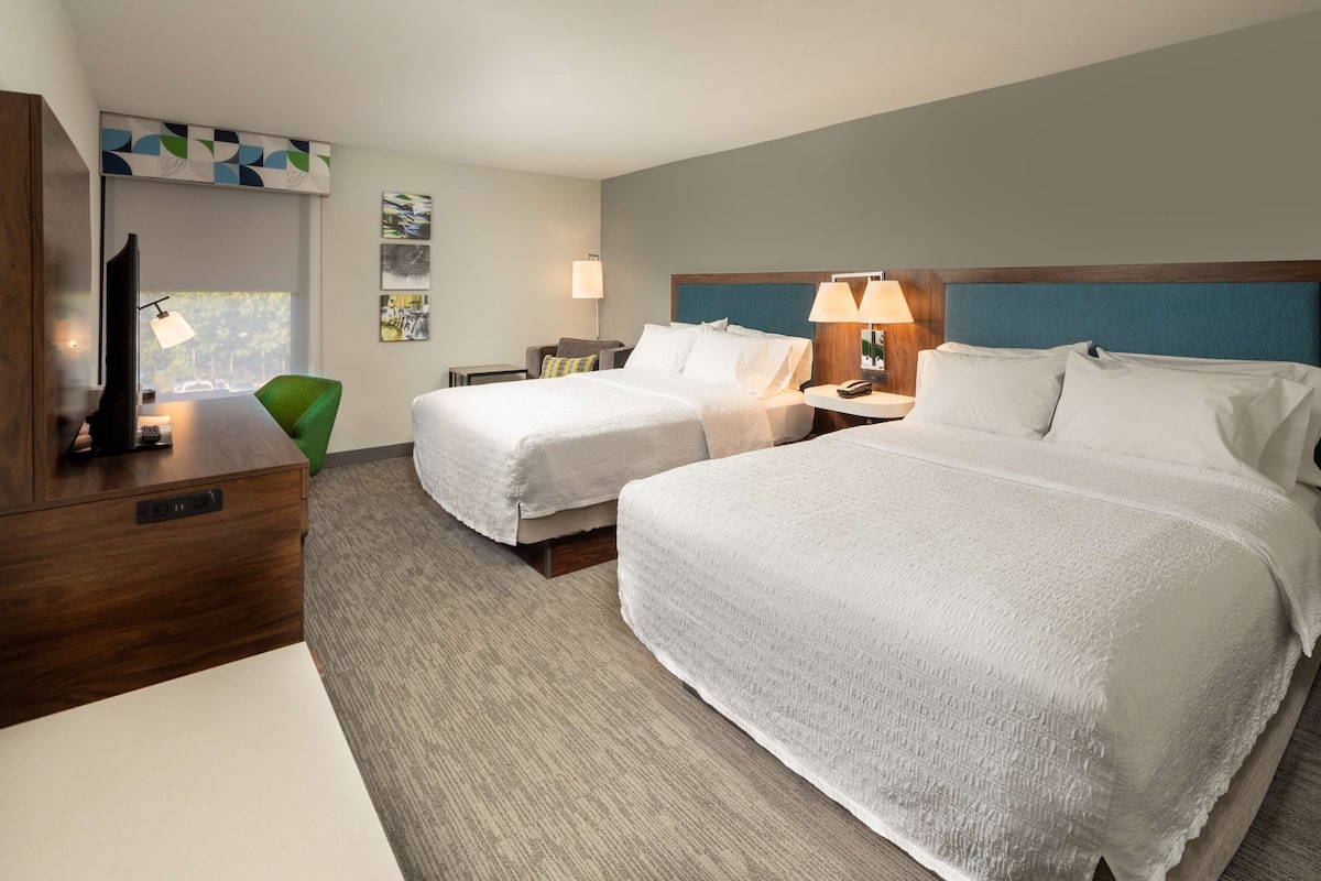 premium bedding, down duvets, desk, blackout curtains