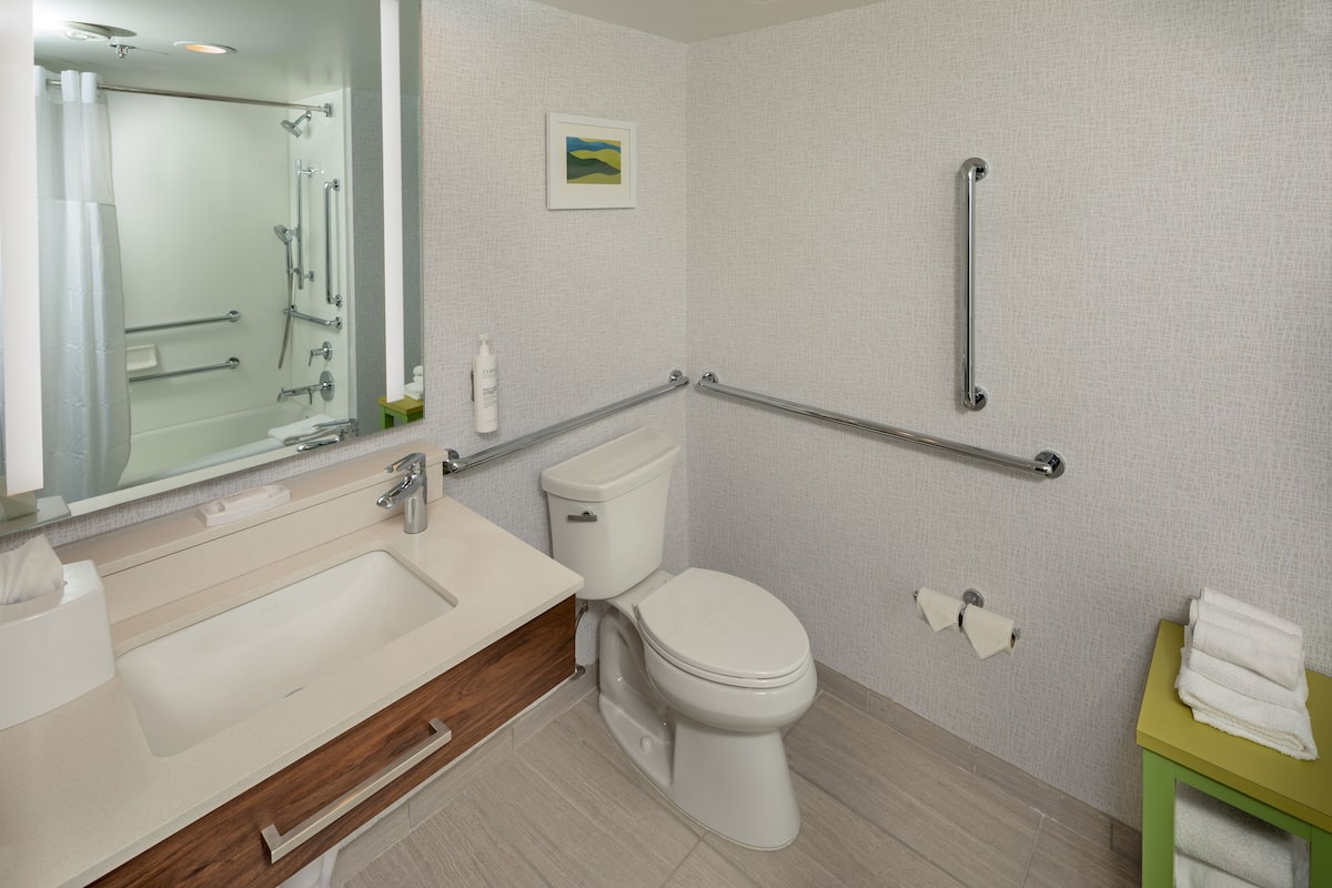 eco-friendly toiletries, hair dryer, towels, soap