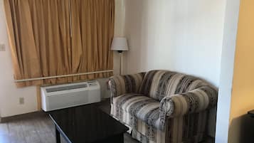32-inch flat-screen TV with cable channels, TV