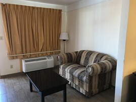 32-inch flat-screen TV with cable channels, TV