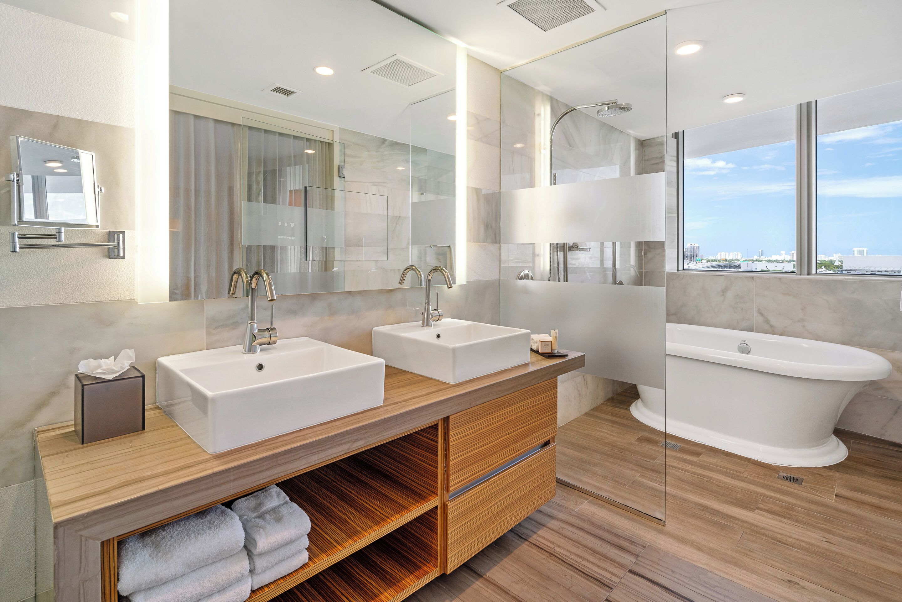 designer toiletries, hair dryer, bathrobes, slippers