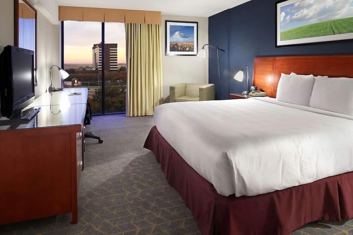 Premium bedding, down duvets, in-room safe, desk